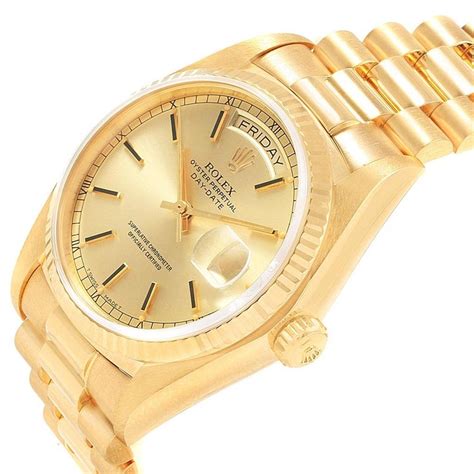 rolex 18 karat gold watch.